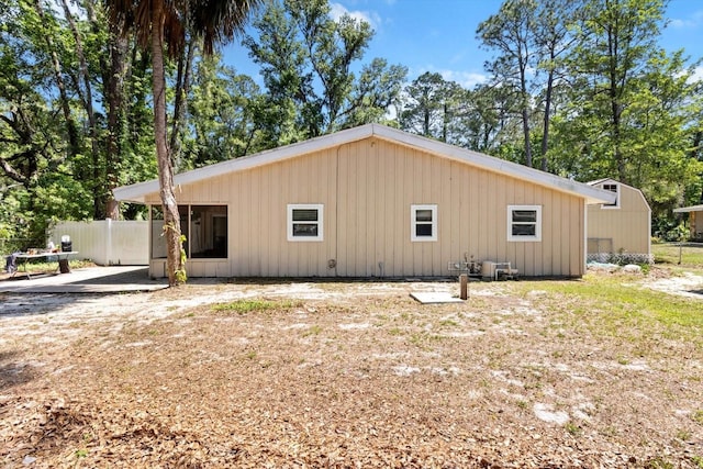 3728 S Eastpark Way, Homosassa, FL 34446 - view of side of home featuring fence and a patio area