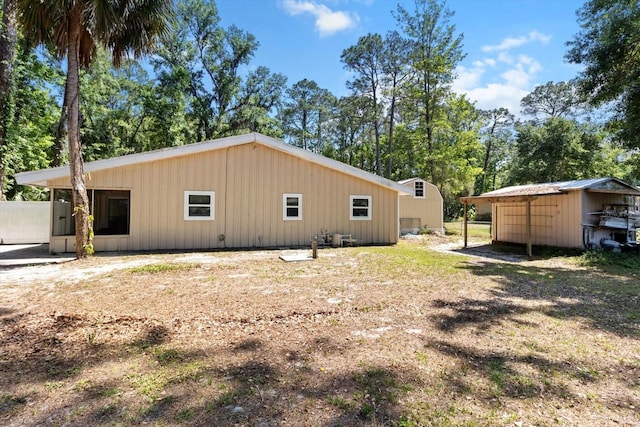 3728 S Eastpark Way, Homosassa, FL 34446 - rear view of house with board and batten siding