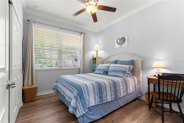 9642 SW 95th Loop, Ocala, FL 34481 - bedroom featuring wood finished floors, a closet, crown molding, and ceiling fan