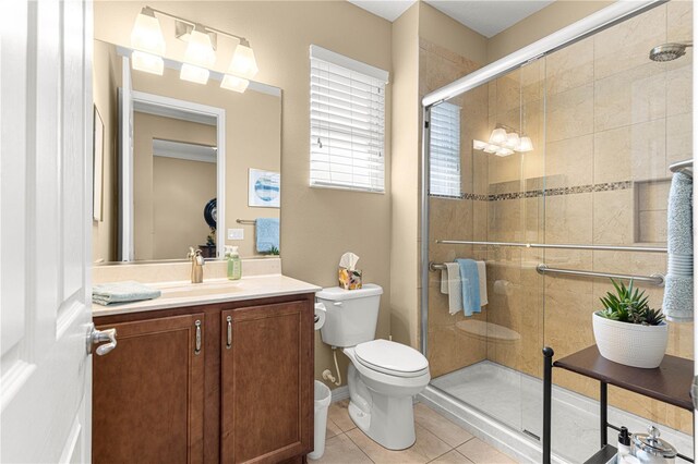 9642 SW 95th Loop, Ocala, FL 34481 - bathroom with vanity, a shower stall, and tile patterned floors