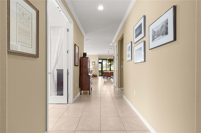 9642 SW 95th Loop, Ocala, FL 34481 - corridor featuring ornamental molding, light tile patterned floors, and recessed lighting