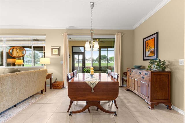 9642 SW 95th Loop, Ocala, FL 34481 - dining area with crown molding, healthy amount of natural light, light tile patterned floors, and a ceiling fan