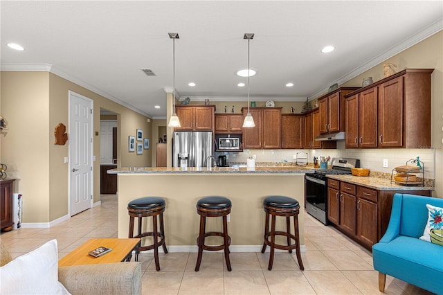 9642 SW 95th Loop, Ocala, FL 34481 - kitchen with appliances with stainless steel finishes, under cabinet range hood, crown molding, a breakfast bar area, and tasteful backsplash