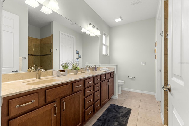 9642 SW 95th Loop, Ocala, FL 34481 - bathroom featuring double vanity, a shower stall, and tile patterned flooring