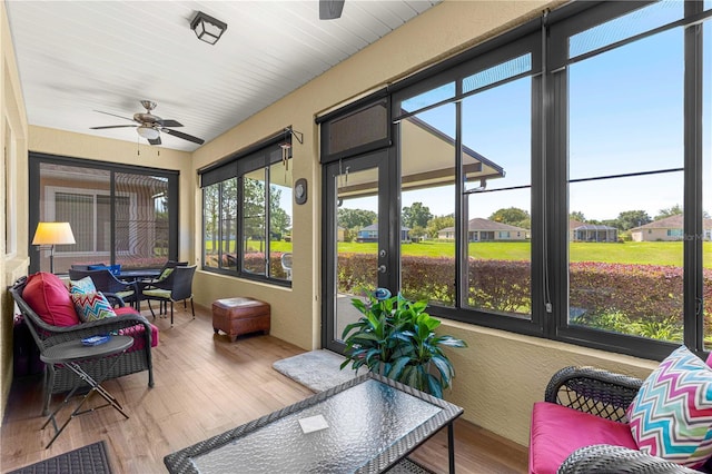 9642 SW 95th Loop, Ocala, FL 34481 - sunroom featuring a ceiling fan and an outdoor hangout area