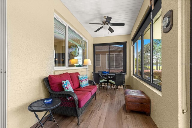 9642 SW 95th Loop, Ocala, FL 34481 - sunroom with a ceiling fan and outdoor dining area