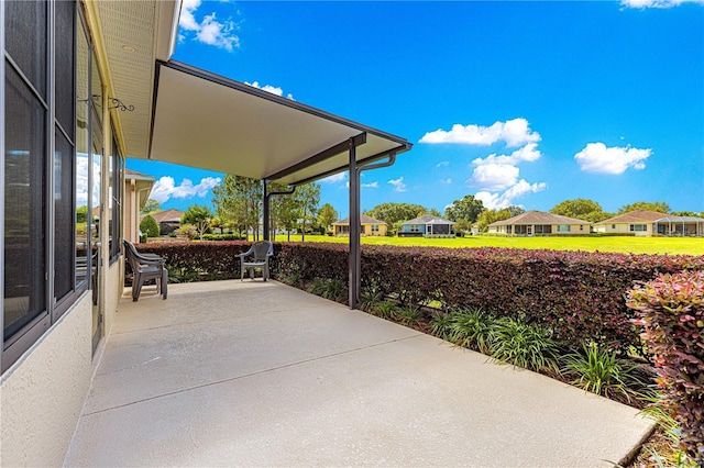 9642 SW 95th Loop, Ocala, FL 34481 - view of patio / terrace featuring a residential view