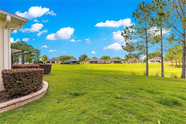 9642 SW 95th Loop, Ocala, FL 34481 - view of grassy yard with a residential view