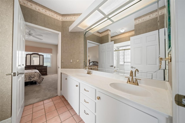 11586 SW 75th Cir, Ocala, FL 34476 - ensuite bathroom with tile patterned floors, double vanity, a ceiling fan, and a shower