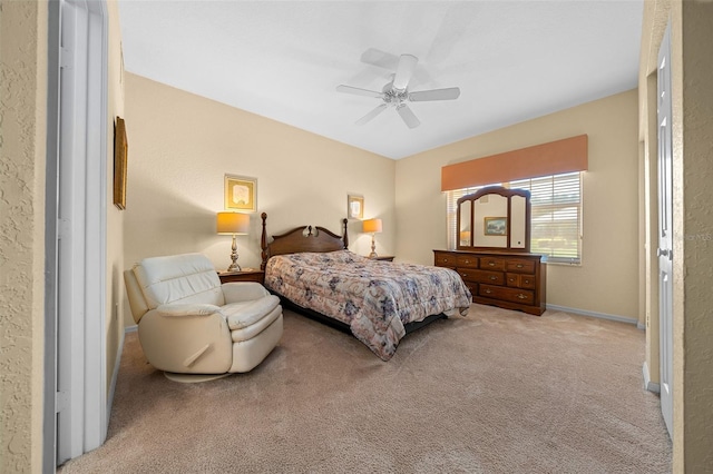11586 SW 75th Cir, Ocala, FL 34476 - bedroom with carpet, a ceiling fan, baseboards, and a textured wall