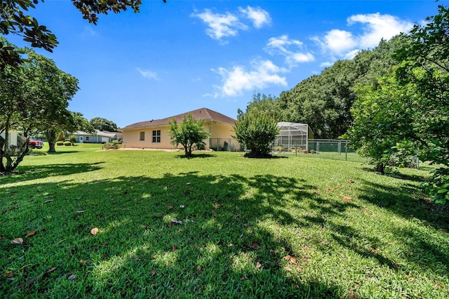 11586 SW 75th Cir, Ocala, FL 34476 - view of yard with a greenhouse and an outbuilding