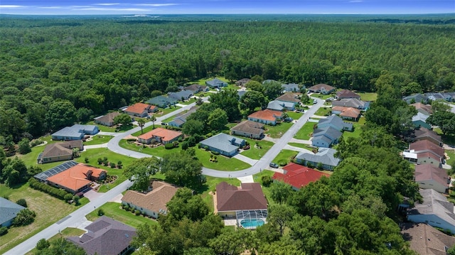 11586 SW 75th Cir, Ocala, FL 34476 - aerial view of property's location with a forest and nearby suburban area