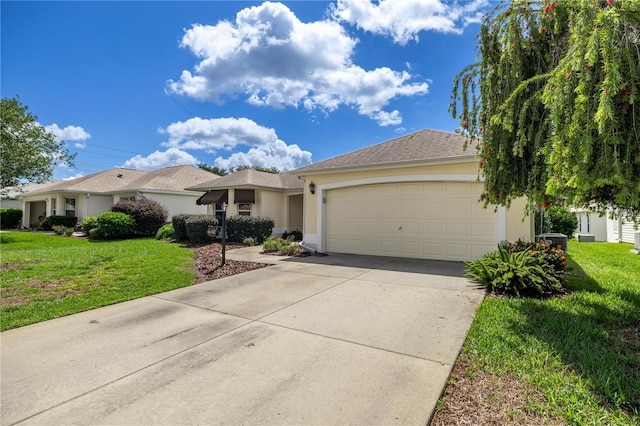 8352 SE 168th Trinity Pl, The Villages, FL 32162 - ranch-style home with an attached garage, driveway, stucco siding, and a front yard
