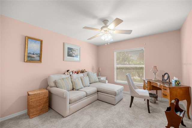 8352 SE 168th Trinity Pl, The Villages, FL 32162 - carpeted living room with a ceiling fan and baseboards