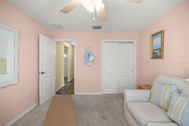 8352 SE 168th Trinity Pl, The Villages, FL 32162 - sitting room with carpet flooring, ceiling fan, and baseboards