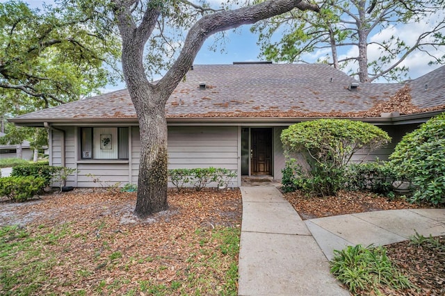 1001 Old Mill Pond Rd, Palm Harbor, FL 34683 - view of front facade featuring roof with shingles