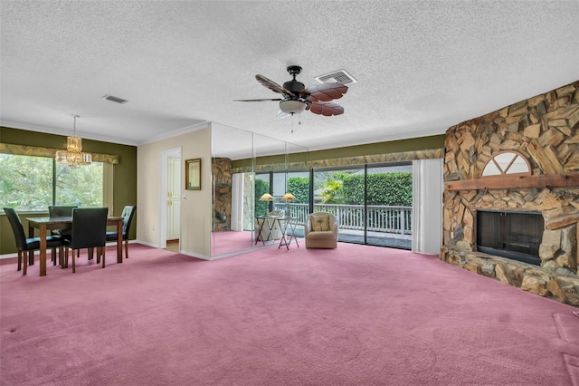 1001 Old Mill Pond Rd, Palm Harbor, FL 34683 - living area featuring a chandelier, a fireplace, carpet, a textured ceiling, and ornamental molding