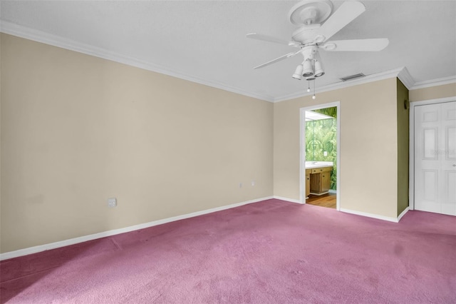 1001 Old Mill Pond Rd, Palm Harbor, FL 34683 - empty room featuring carpet, ceiling fan, baseboards, and crown molding