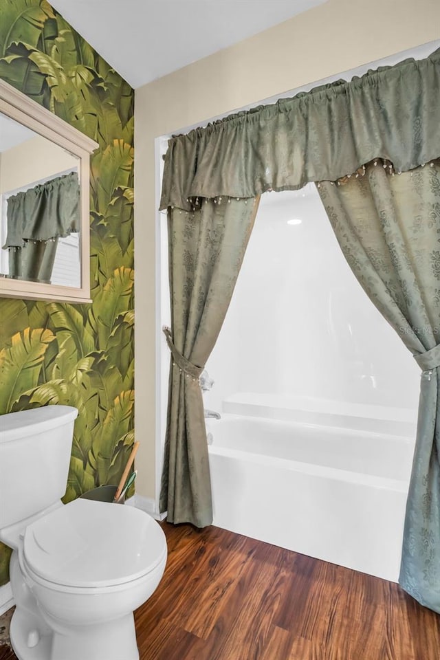1001 Old Mill Pond Rd, Palm Harbor, FL 34683 - full bath with toilet and wood finished floors