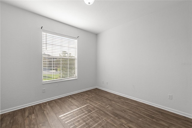 7270 SW 99th Cir, Ocala, FL 34481 - unfurnished room with dark wood-style flooring and baseboards