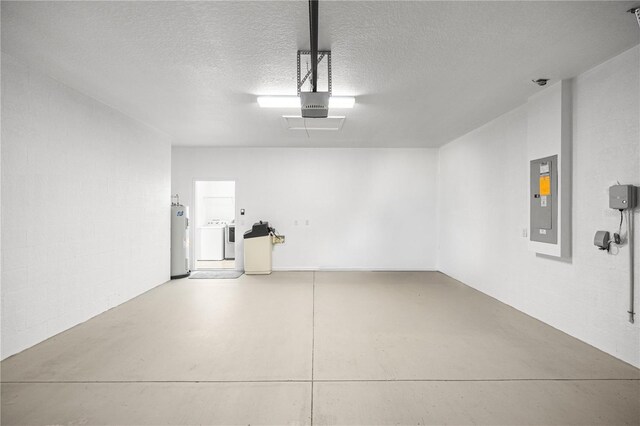 7270 SW 99th Cir, Ocala, FL 34481 - garage featuring separate washer and dryer, electric water heater, a garage door opener, and electric panel