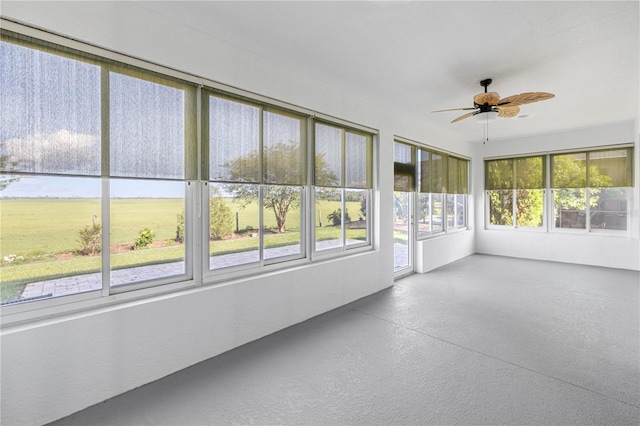 7270 SW 99th Cir, Ocala, FL 34481 - unfurnished sunroom with a ceiling fan and finished concrete floors