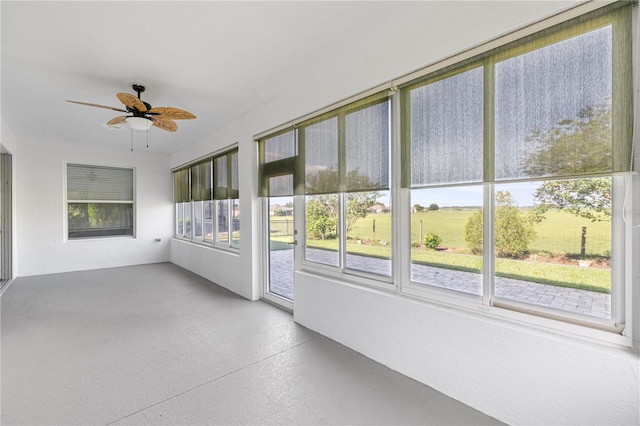 7270 SW 99th Cir, Ocala, FL 34481 - unfurnished sunroom featuring concrete floors