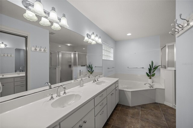5661 NW 96th Ln, Ocala, FL 34482 - bathroom with a stall shower, a bath, double vanity, and tile patterned flooring