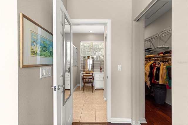 9628 SW 90th St, Ocala, FL 34481 - hall with light tile patterned floors and baseboards