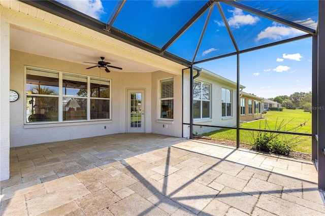 9628 SW 90th St, Ocala, FL 34481 - unfurnished sunroom featuring a ceiling fan