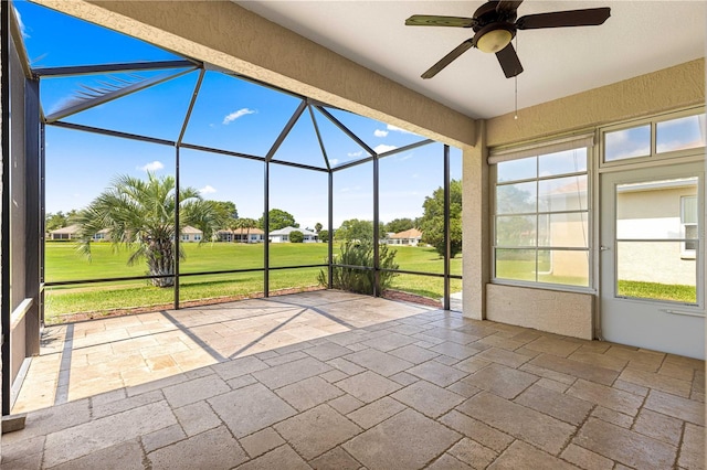 9628 SW 90th St, Ocala, FL 34481 - unfurnished sunroom featuring ceiling fan