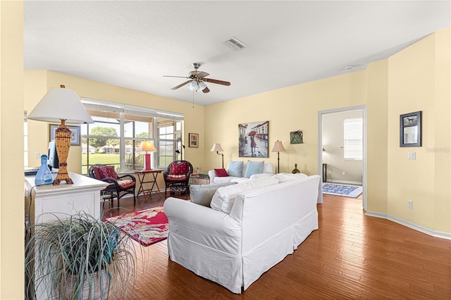 9628 SW 90th St, Ocala, FL 34481 - living room featuring wood finished floors and ceiling fan