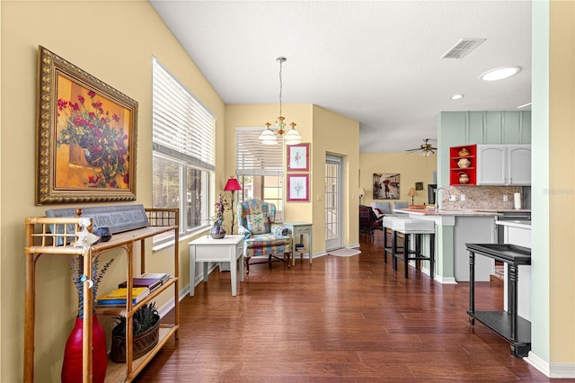 9628 SW 90th St, Ocala, FL 34481 - dining space featuring dark wood-type flooring, a chandelier, and recessed lighting