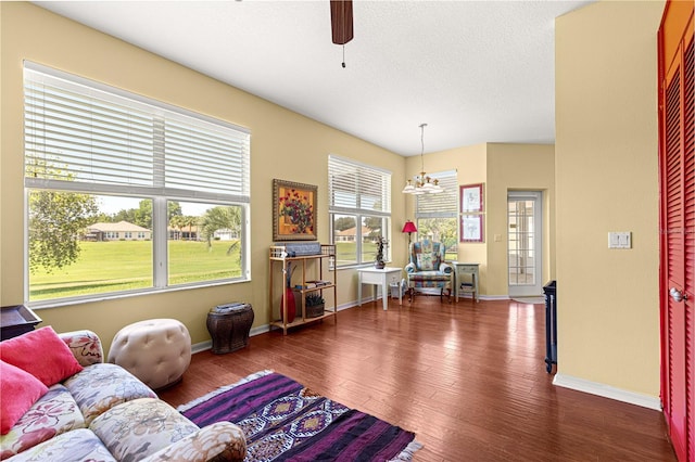 9628 SW 90th St, Ocala, FL 34481 - living area featuring ceiling fan, a chandelier, and dark wood finished floors