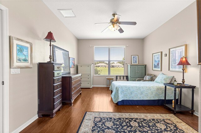 9628 SW 90th St, Ocala, FL 34481 - bedroom with dark wood finished floors and a ceiling fan