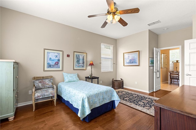 9628 SW 90th St, Ocala, FL 34481 - bedroom featuring wood finished floors, multiple windows, and ceiling fan