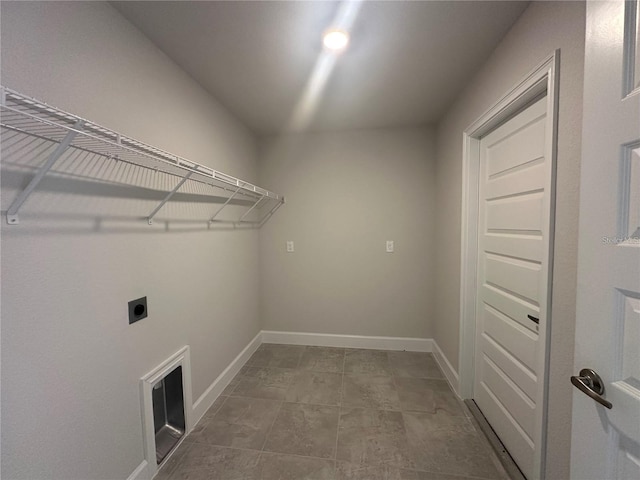 15106 SE 94th Ter, Summerfield, FL 34491 - clothes washing area with hookup for an electric dryer and baseboards