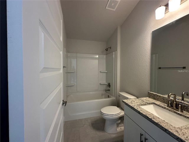 15106 SE 94th Ter, Summerfield, FL 34491 - full bath featuring toilet, vanity, shower / bath combination, a textured wall, and tile patterned floors