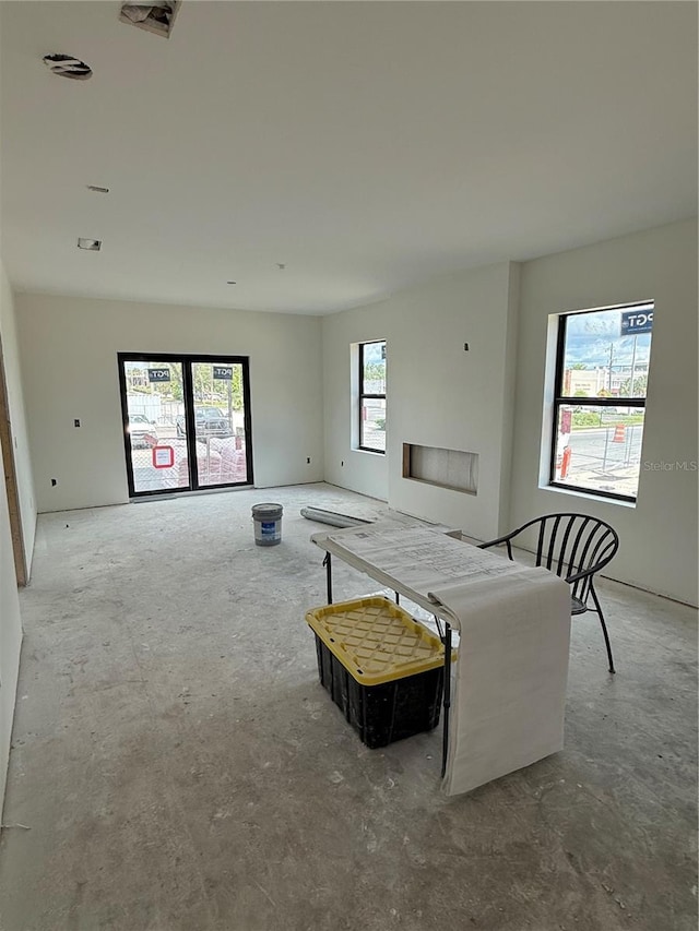 living room with concrete flooring