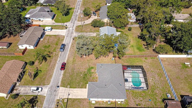 aerial view of residential area featuring a pool area