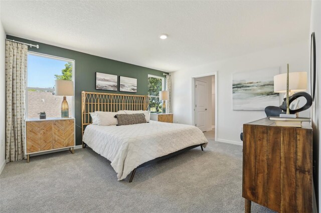 4955 SW 51st Rd, Gainesville, FL 32608 - bedroom featuring carpet floors, baseboards, and recessed lighting