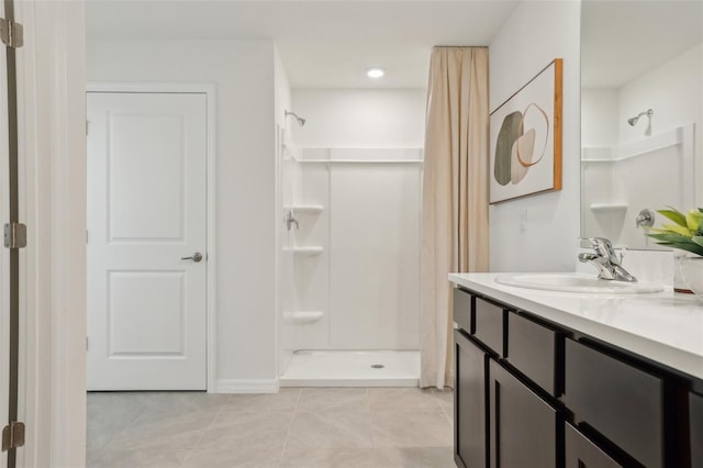 4955 SW 51st Rd, Gainesville, FL 32608 - bathroom featuring a shower with curtain, tile patterned flooring, and vanity