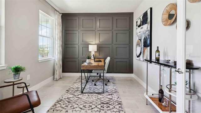 office space with baseboards