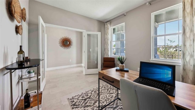office area featuring french doors and baseboards