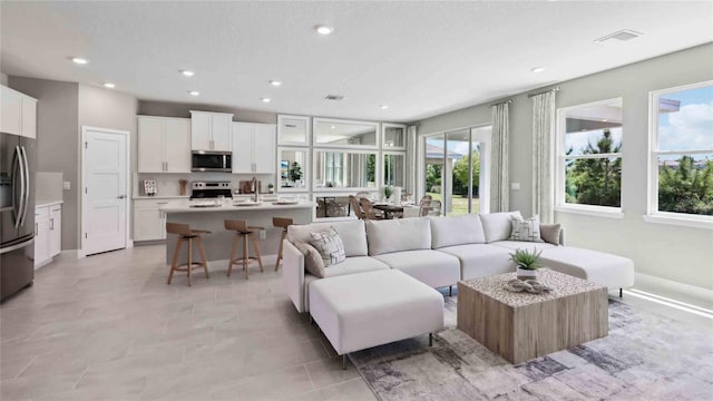 living area with recessed lighting