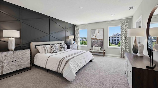 bedroom featuring carpet floors, baseboards, and recessed lighting