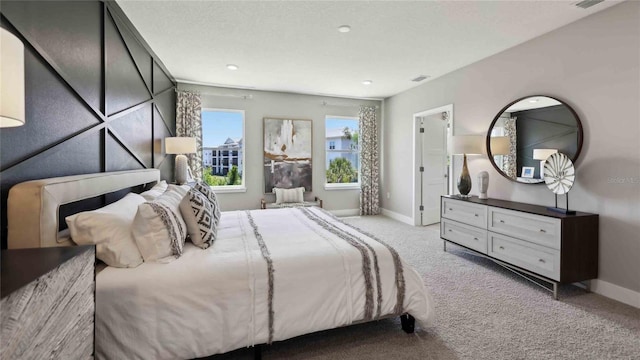 bedroom with carpet and baseboards