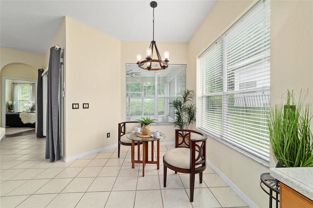2631 SW 20th Cir, Ocala, FL 34471 - sitting room featuring a chandelier, light tile patterned flooring, and baseboards
