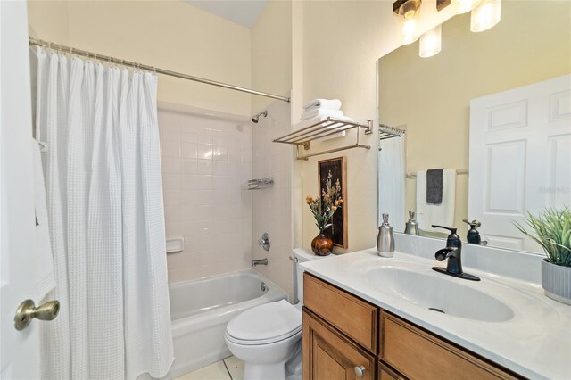 2631 SW 20th Cir, Ocala, FL 34471 - full bathroom featuring vanity, shower / bath combination with curtain, and toilet