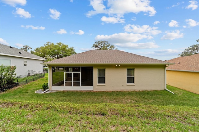 2631 SW 20th Cir, Ocala, FL 34471 - rear view of property featuring a sunroom and stucco siding